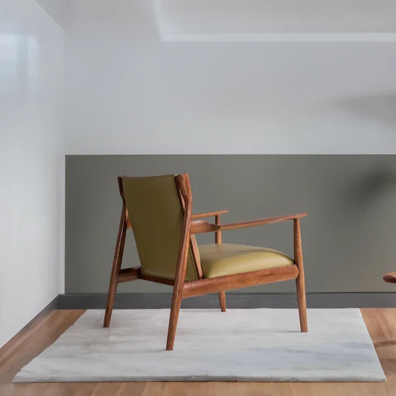 A vibrant yellow accent chair: A relaxing personal seat that's always obliging